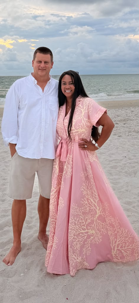 Erik and Liena Bems standing together on the beach